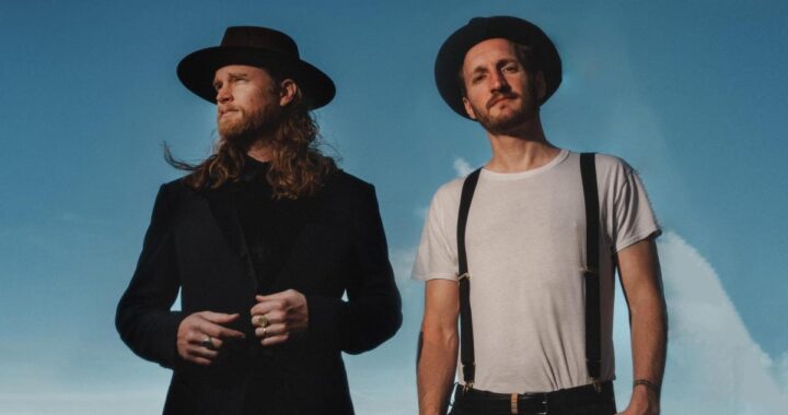 Cartel oficial del concierto de The Lumineers en Quito 2026 con fechas y ubicación en Arena Top Media