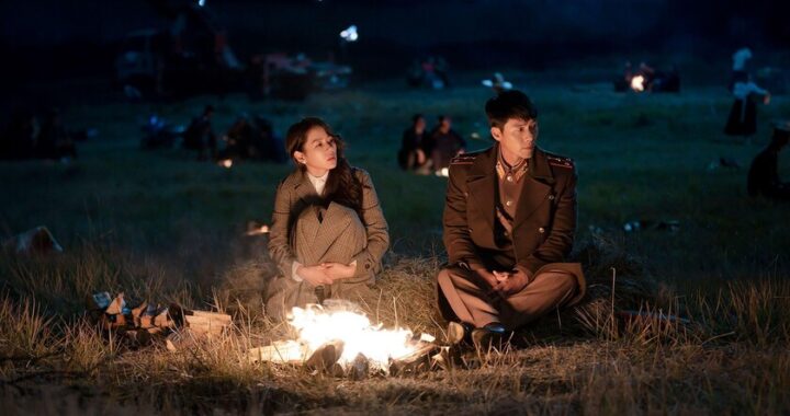 Pareja en k-drama con mirada intensa a cámara lenta, reflejando el 'slow burn' que engancha a millones