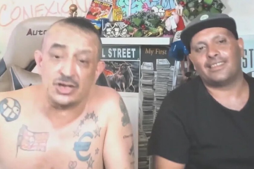 Captura de pantalla de un streamer en directo con botella de whisky y polvo blanco sobre la mesa durante reto mortal