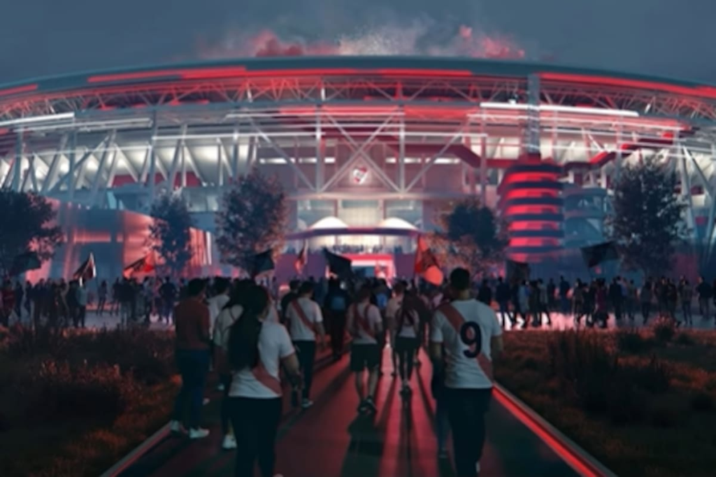 Vista aérea del Estadio Monumental con luces de concierto iluminando las gradas, símbolo del acuerdo récord de River por US$110M