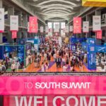 Fundadores de CryptoMate y Wise CX recibiendo reconocimiento en South Summit Madrid 2026 con el Rey Felipe VI